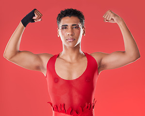 Image showing Strong, power and portrait of a gay man for boxing isolated on a red background in a studio. Strength, training and lgbt fighter showing muscle for a fight, self defense and sport on a backdrop