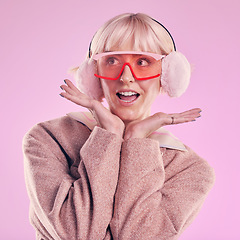 Image showing Fashion, woman and quirky in studio with wow, surprise and comic glasses on pink background. Aesthetic model person with hands on face thinking about edgy vaporwave trend with creativity and color