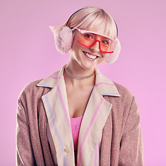 Image showing Fashion, portrait and a happy woman in studio with a smile, creativity and comic glasses on pink background. Face of an aesthetic model person with a smile for edgy vaporwave trend with color