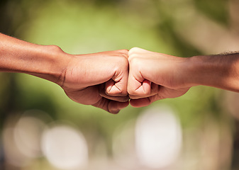 Image showing Fist bump, hands and teamwork, support or collaboration for team building, solidarity or unity. Hand connection, partnership or greeting, thank you or motivation for success, goal or targets outdoors