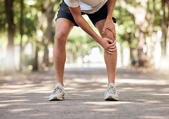 Image showing Hands, knee pain and legs injury at park after training, workout or exercise accident. Sports, fitness and man or runner with fibromyalgia, inflammation or arthritis after .exercising, running or jog