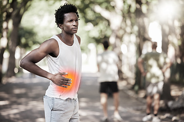 Image showing Health, fitness and black man with stomach pain at park after exercise, training or workout. Sports, thinking and male athlete with appendicitis injury, inflammation or painful abdominal muscles.