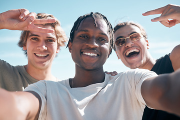 Image showing Selfie, diversity and portrait of male friends on a summer vacation, weekend trip or adventure. Happy, sky and multiracial men with a smile taking picture with hand gestures while on holiday together
