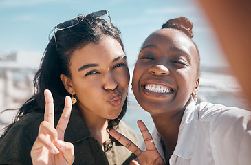 Image showing Woman, friends and smile with peace sign for selfie, profile picture or vlog at the beach for summer vacation. Portrait of happy women smiling for photo memory, friendship or joy by the ocean coast