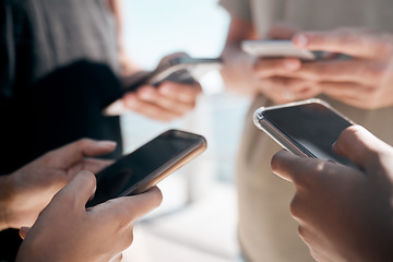 Image showing Hands, phone and people networking on social media, mobile app or chatting on mockup screen. Hand of group holding smartphone in circle for online network share, data sync or communication on display