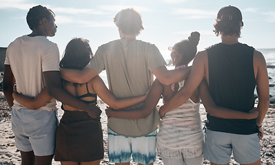 Image showing Friends, back or standing hug by beach, ocean or sea in social gathering, group vacation or relax summer holiday. Men, women or diversity people in embrace, travel bonding or nature community support