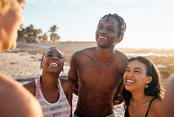 Image showing Friends, laughing or bonding on sunset beach in joke, social gathering comedy or comic group vacation for summer holiday. Smile, happy women or diversity people, travel swimsuit or funny storytelling