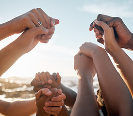 Image showing People, bonding and holding hands on beach social gathering, community trust support or summer holiday success. Men, women and diversity friends in solidarity, team building or travel mission goals