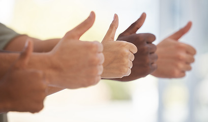 Image showing Thumbs up, hands and business people with thank you, success and yes sign on blurred background. Partnership, collaboration and hand emoji sign by team showing icon, symbol and approval with fingers