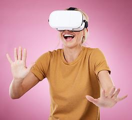 Image showing Excited woman, vr glasses and metaverse for future technology, gaming and digital transformation. Person with wow virtual reality, 3d and cyber world experience with ai headset on pink background