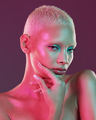 Image showing Art, beauty and portrait woman with neon makeup and lights for creative advertising on studio background. Cyberpunk, gen z face of girl and model isolated for skin care and futuristic mock up space.