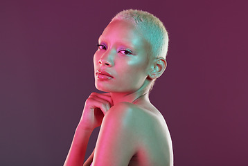 Image showing Cyberpunk, beauty and portrait of woman with neon makeup and lights in creative advertising on studio background. skincare, art girl and model isolated for futuristic skin care mockup space.