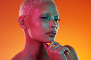 Image showing Neon, beauty and portrait of woman thinking in face makeup and light in creative advertising on orange background. Cyberpunk, art and model isolated in skincare and futuristic mockup space in studio.