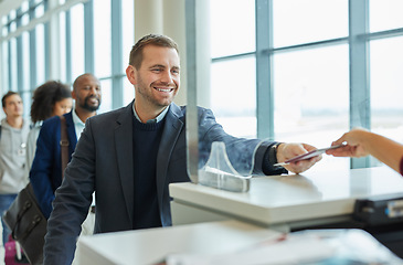 Image showing Ticket check, window and business man in airport queue for passport or travel service. Happy customer person at security or consultant booth or counter for transport booking and buying pass at seller