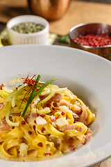 Image showing Noodles with cheese and prosciutto
