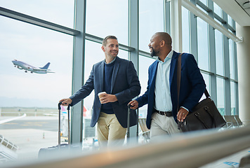Image showing Travel for business, team at airport and men, catch flight for work trip with conference or training seminar with accountant. Walk, talk and diversity with finance convention and partnership