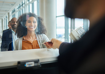 Image showing Black woman, ticket check and airport counter with a paper for travel or box office service. Happy customer person at consultant booth window for passport, work booking and buying pass at seller
