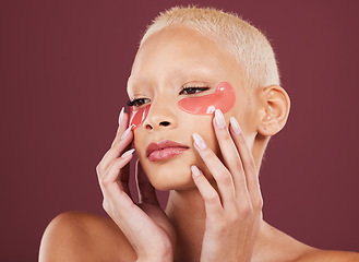 Image showing Eye patches, makeup and skincare of black woman beauty with cosmetics and dermatology treatment. Spa and young model in a studio with wellness facial for eyes and cosmetic face mask with collagen