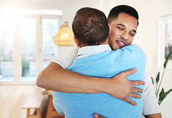 Image showing Love, care and father and son with a hug for a visit, bonding and quality time. Happy, affection and dad hugging a man with an embrace after reunited, missing or showing appreciation in a home