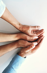 Image showing Hands together, business people and solidarity of company group with work community and connection. Teamwork, support and trust of office team with white background showing collaboration goals