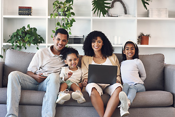 Image showing Family, home and laptop for portrait on couch while learning with online education, games or movie. Mother, father and girl kids together on couch with internet and parents teaching for development