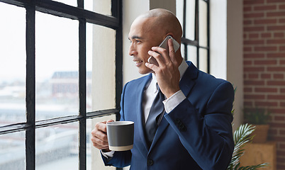 Image showing Business man with phone call, coffee and communication in office, CEO and networking with negotiation. View out the window, investment banker with conversation, professional making finance deal