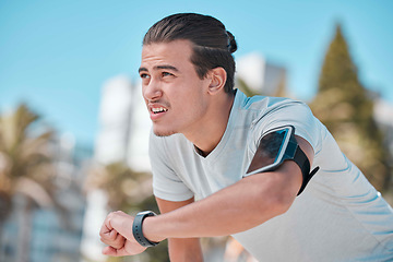 Image showing Smart watch, outdoor workout and man tired from exercise, fitness and running. Stopwatch time, sports person and breathing for heart rate, marathon progress goals or monitor wellness on data app gear