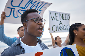 Image showing Climate change, sign and black man profile with megaphone for freedom movement. Angry, crowd screaming and young people by the sea with world support for global, social and equality action at ocean