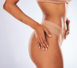 Image showing Woman, stretch marks and underwear in studio for beauty, dermatology spa and skincare wellness. Female model, cellulite and body waist for cosmetic diet, aesthetic liposuction and mockup background