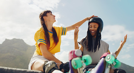 Image showing Fun, playful and interracial couple rollerskating at a park, helping with helmet and gear in Brazil. Happy, laughing and man and woman getting ready to skate while bonding, talking and active