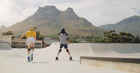 Image showing Hobby, fun and couple rollerskating at a park for sport, learning and bonding in Norway. Health, vacation and back of a man and woman on skates for quality time, recreation and activity in the city