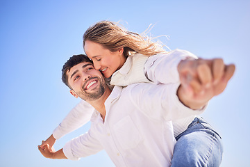 Image showing Freedom, piggyback and couple on adventure date for romance, valentines day or anniversary. Romantic, sky and happy young man and woman having fun together on a weekend trip or holiday in Australia.