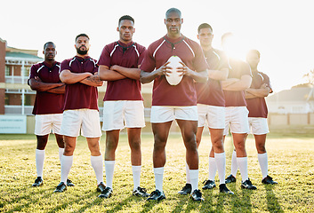 Image showing Rugby, grass and portrait of men, team with ball and standing together with confidence for winning game. Diversity, black man and group of strong sports people in leadership, fitness and teamwork.