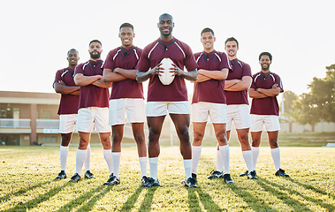 Image showing Rugby, grass and portrait of team with smile standing together in confidence and solidarity for winning game. Diversity, black man and group of strong sports men with leadership, fitness and teamwork