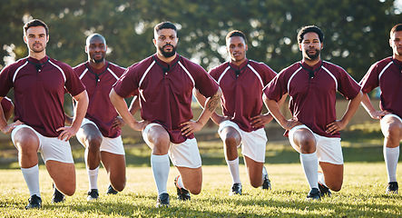 Image showing Rugby, racial activism or team take a knee in solidarity or support for a match, game or sports match. Men, fitness or group of male athletes in unity against inequality or global racism on grass