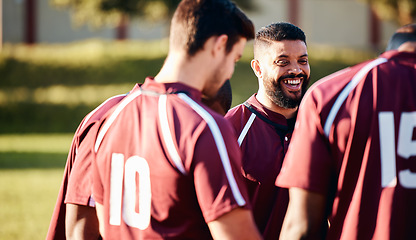 Image showing Sports, team and coach on field, training and happiness for achievement, success and wellness. Group, men and trainer with athletes, practice and workout with smile, healthy lifestyle and fitness