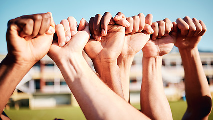 Image showing Fist hands, sport community and hand closeup of exercise team together on a outdoor field. Sports support, workout and fitness friends ready for a athlete competition with solidarity and teamwork