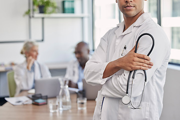 Image showing Stethoscope, arms crossed and medical with hands of doctor for medicine, leadership or confidence in clinic. Wellness, healthcare and trust with man in hospital for expert, professional or consulting