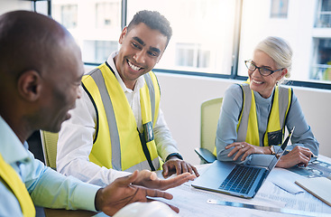 Image showing Architect, laptop and meeting for industrial construction, team planning or idea strategy at office. Group of diverse engineers or contractors discussing floor plan for project layout or architecture