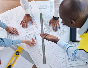 Image showing Architect, hands and blueprint in meeting above for construction, team planning or strategy for project layout at office. Hand of group in engineering discussing floor plan drawing for architecture