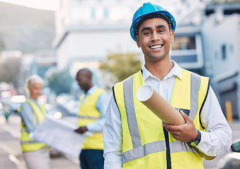 Image showing Construction, architect and blueprint with man in portrait, smile and project plan at job site, contractor and happy leader. Mockup space, helmet for safety and architecture in building industry