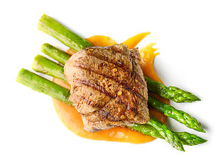 Image showing grilled steak with fried asparagus