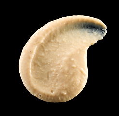 Image showing hummus on black background