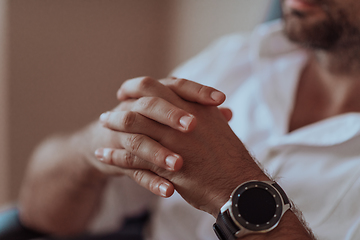 Image showing Close-up photos of the hands of a successful businessman