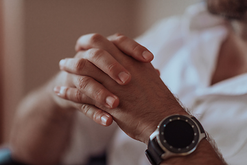 Image showing Close-up photos of the hands of a successful businessman