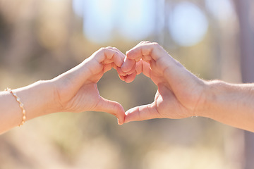 Image showing Heart hands, nature and love, support and commitment partnership for marriage outdoors. Valentines day, romance and couple, man and woman with emoji for care, relationship and affection or trust.