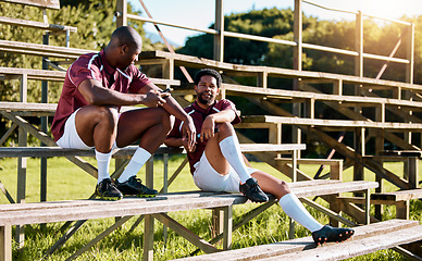 Image showing Sports, fitness and rugby with black man on bench for relax, workout and championship training. Exercise, teamwork and health with friends on bleachers at field for game practice, cardio and wellness