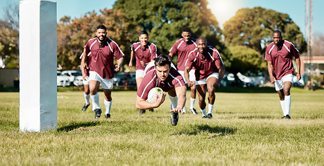 Image showing Rugby, team on field and sports game with men, athlete running and player score a try with ball, fitness and active outdoor. Exercise, championship match and teamwork with jump, action and energy