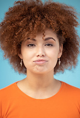 Image showing Hair care, tired and portrait of a woman with an afro isolated on a blue background in a studio. Sad, stress and face of a frustrated girl with frizz, dry and problem with a hairstyle on a backdrop