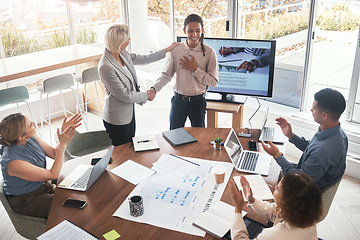 Image showing Business handshake, employee appreciation and applause at team building for company growth. Working, market research data and well done of a female manager with marketing group in office with tech